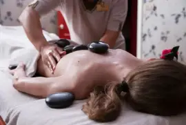 Experience Bliss with Hot Stone Massage Services!